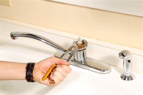 sink faucet leaking from base|Kitchen Faucet Leaking At Base: Causes & 5 Quick。